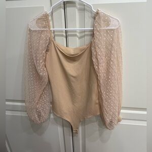 Chic Nude Bodysuit with Sheer Polka Dot Sleeves